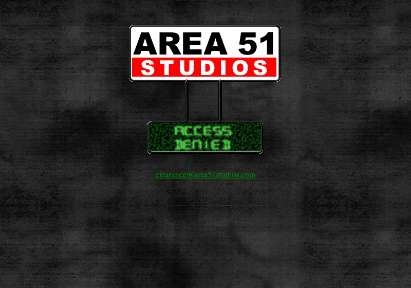 The Area 51 Studios homepage in October 2000: the logo sign with an ACCESS DENIED LED panel and a single email link, clearance at area51studios dot com, on a dark textured background